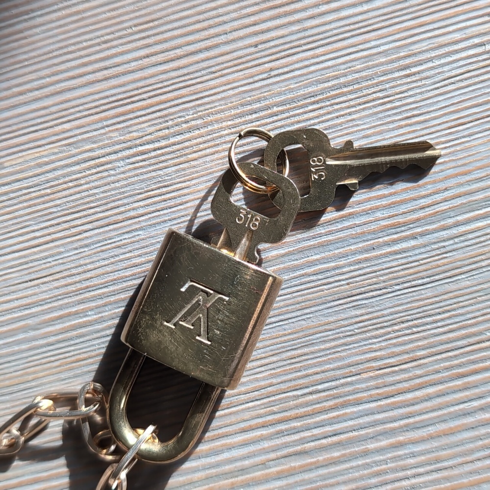 Louis Vuitton Lock & 2 Keys #318, on paper clip chain. - Picture 2 of 3